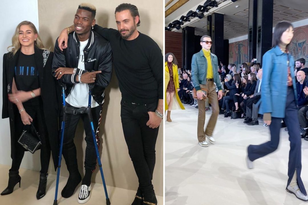 Paul Pogba Attends Paris Fashion Show On Crutches