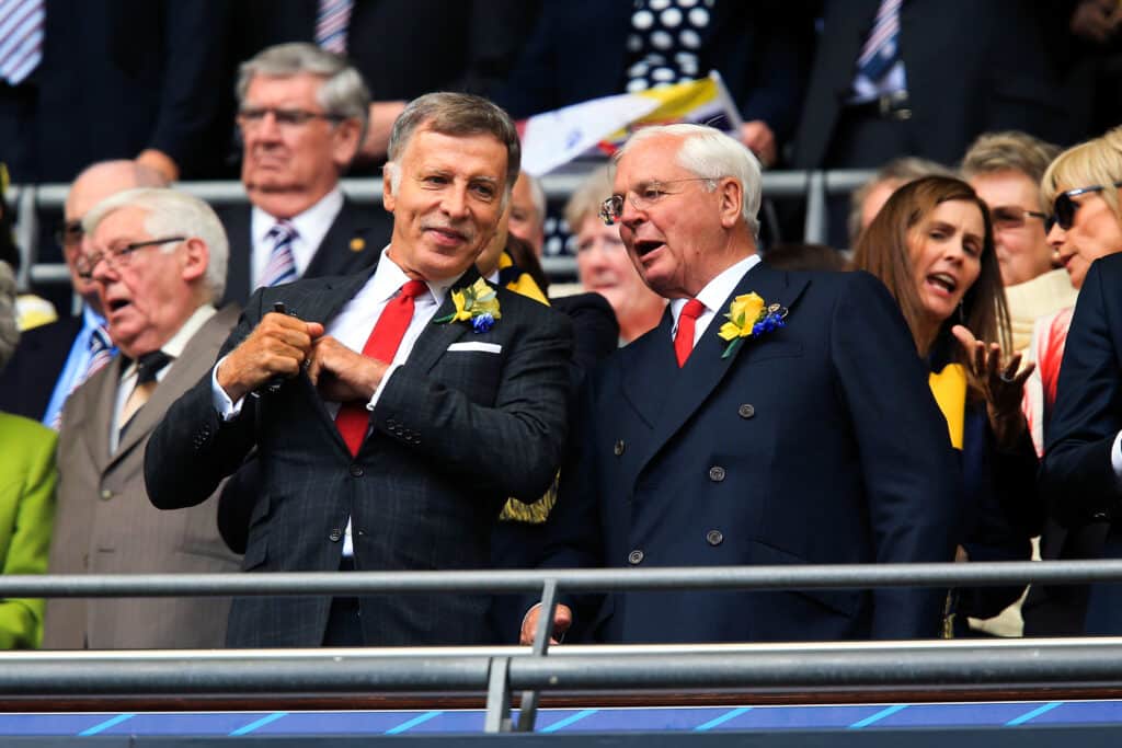 Arsenal's majority shareholder Stan Kroenke (left) and Arsenal chairman Sir Chips Keswick
