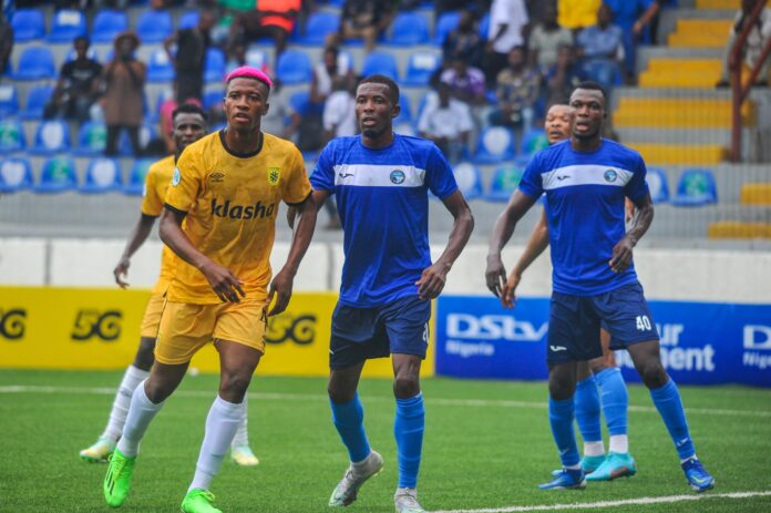 Enyimba players looking to defend a corner Enyimba signs shirt sponsorship deal with Stake