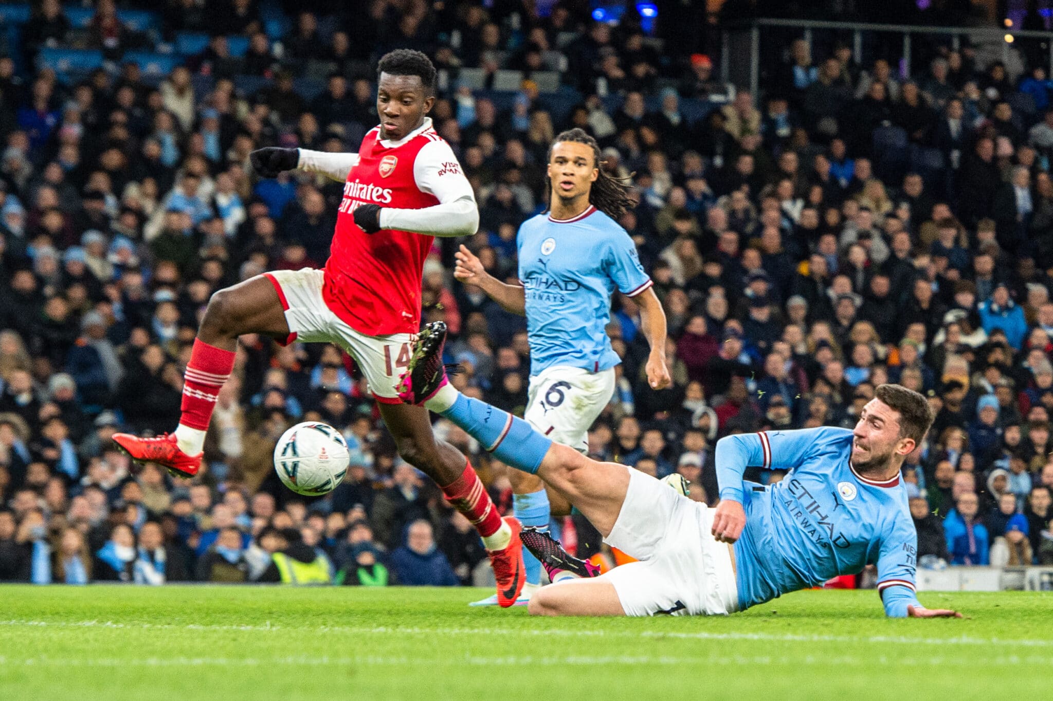 Aymeric Laporte of Manchester City clears ahead of Eddie Nketiah of Arsenal during the FA Cup fourth round match between Manchester City and Arsenal at the Etihad Stadium, Manchester. Picture by Matt Wilkinson/Focus Images Ltd 07814 960751 27/01/2023 - Man City vs Arsenal 