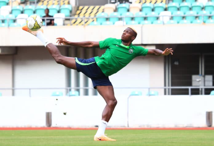 Victor Osimhen tries to control the ball during a Super Eagles training session Osimhen only behind three players in Nigeria’s top goalscorer list