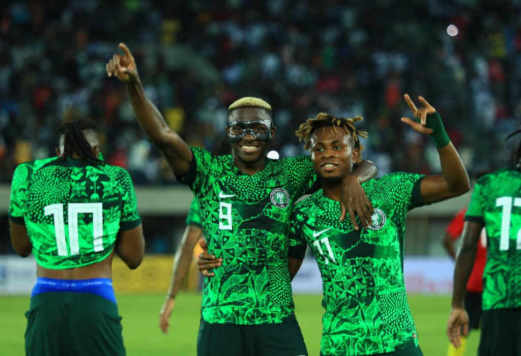 Victor Osimhen of Nigeria celebrates with goalscorer Samuel Chukwueze