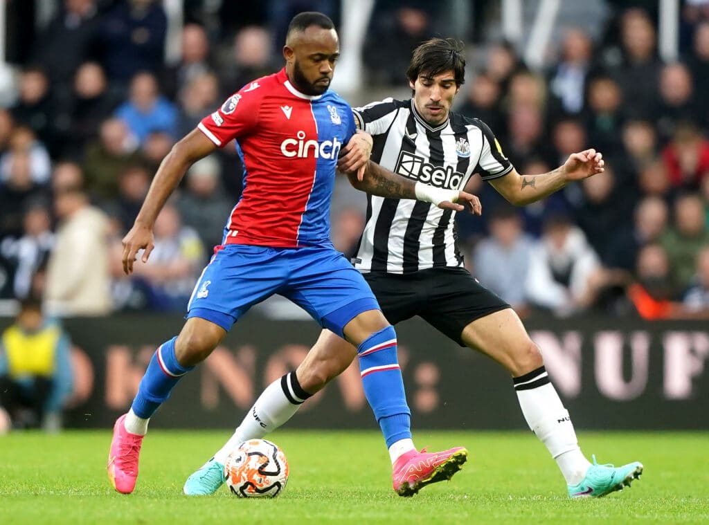 Crystal Palace's Jordan Ayew (left) and Newcastle United's Sandro Tonali battle for the ball during the Premier League